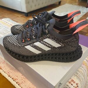 Adidas Black and White Running Shoes with Orange Highlights